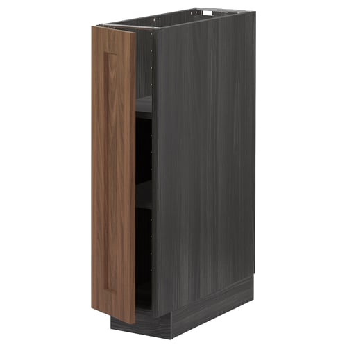 A dark wooden kitchen cabinet, part of the METOD system, featuring walnut-look foils and a modern design.