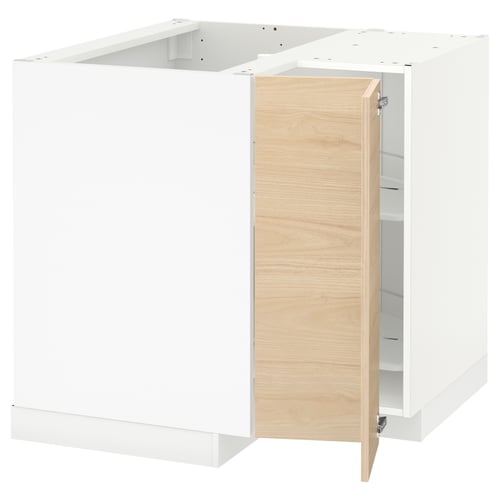 White METOD kitchen cabinet with light ash doors.