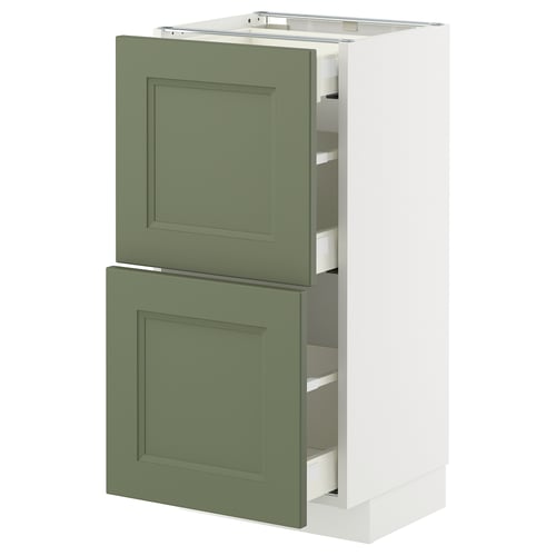 A white METOD kitchen cabinet with two gray-green drawers and a door. It has a modern design with a flat panel and methacrylate surfaces.