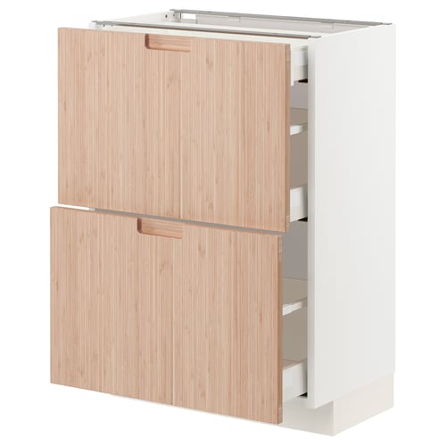 An ikea METOD kitchen cabinet with natural bamboo doors. It two large drawers with a modern, minimalist design in white and light wood.