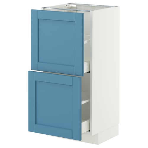 Blue and white kitchen cabinet with two drawers. Modern design, sturdy, wooden drawers, white frame.