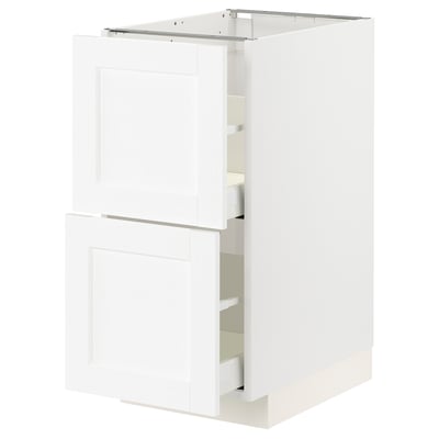 White METOD kitchen cabinet with pull-out drawers.