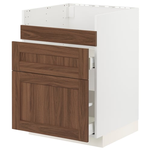 An ikea METOD kitchen cabinet with walnut-colored wood effect doors. It drawers and a white frame.