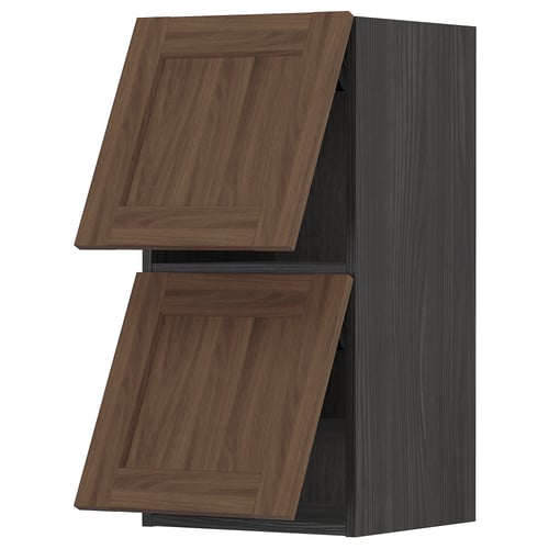 Walnut METOD kitchen cabinet with dark frame, rectangular shape, and wooden texture doors.