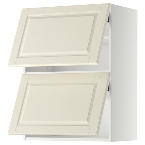 Image shows two white METOD kitchen cabinets with off-white bevelled doors.