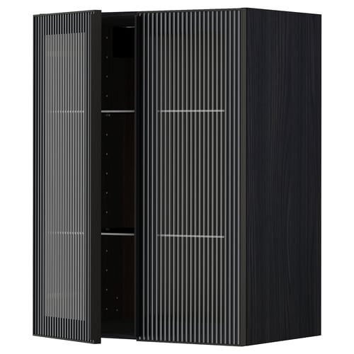 Modern black METOD kitchen cabinet with reeded glass doors and sleek metal frame.