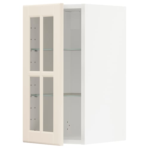 This image shows a beige METOD kitchen cabinet with glass doors and adjustable shelves.