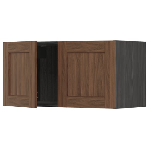 METOD kitchen cabinet with walnut-brown doors, classic wood design, three panels, two open, two closed.