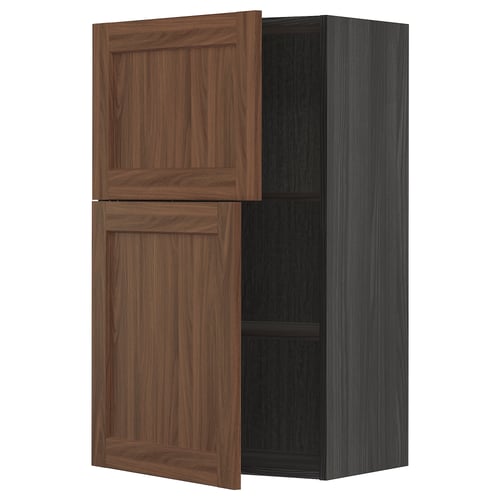 An open METOD kitchen cabinet in walnut brown with wooden texture, featuring two adjustable shelves and hinged doors.