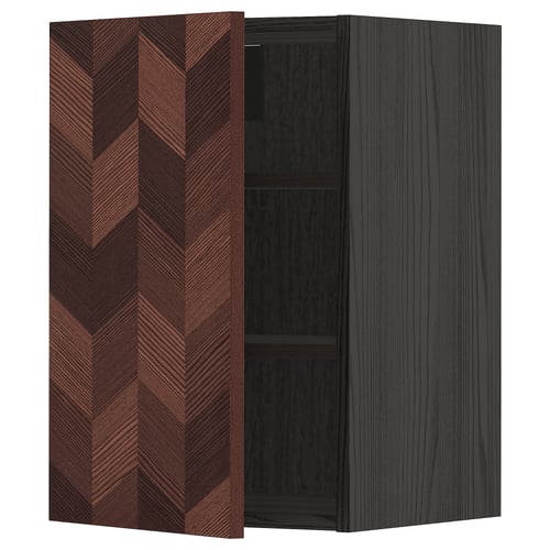 Modern wooden cabinet with herringbone pattern and dark finish, one door open, two shelves inside.