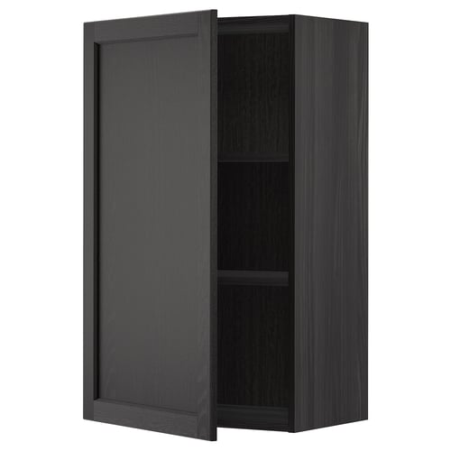 A black METOD kitchen cabinet with a dark stained wood finish. Its a wall-mounted unit with one open shelf and a reversible door.