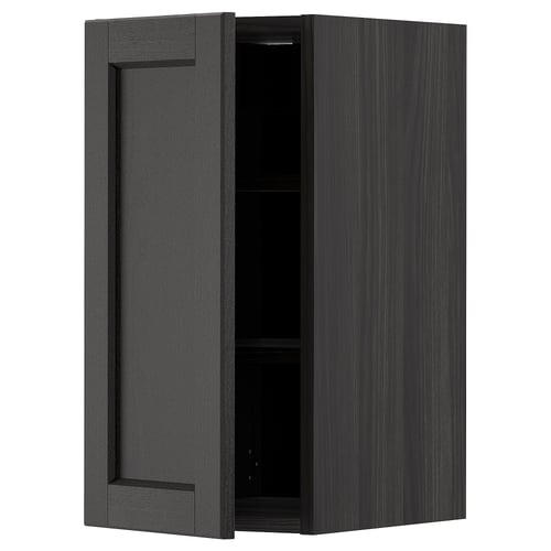 Black stained wooden kitchen wall cabinet with single door and adjustable shelf.