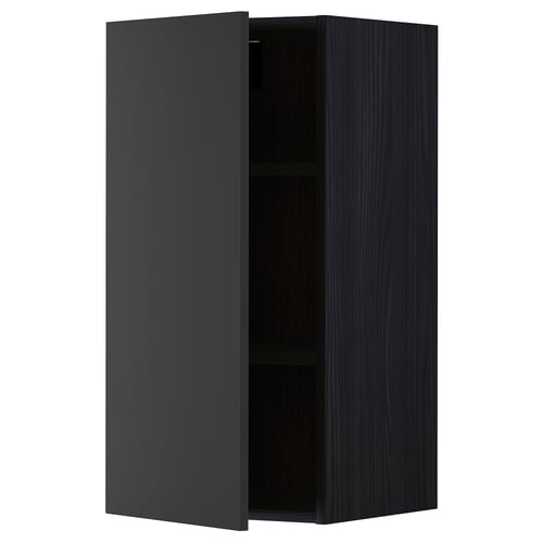 A dark grey kitchen cabinet with one door open, revealing the empty interior.