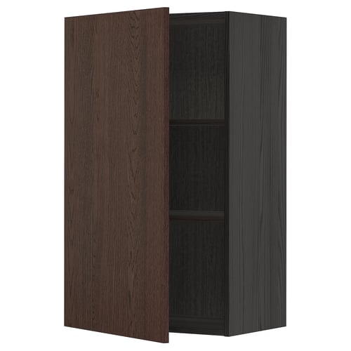 A dark brown wooden wall cabinet with a single open door revealing two shelves.