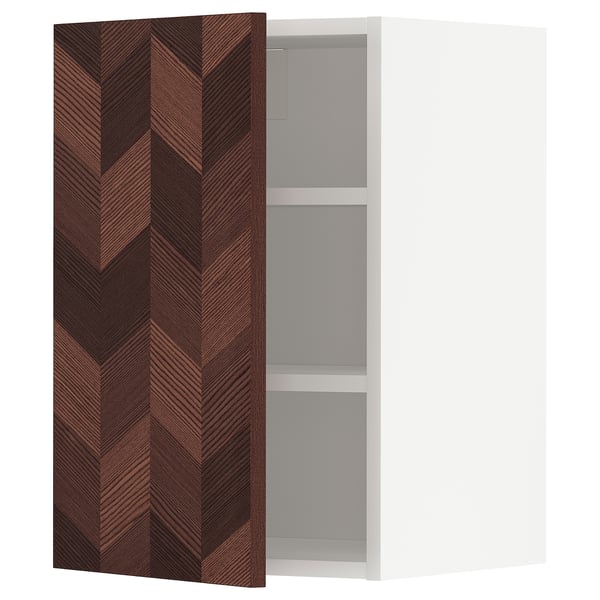 IKEA METOD kitchen cabinet with dark wood herringbone door, white frame, adjustable shelves.