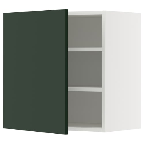 Open white wall cabinet with adjustable shelves, green door.
