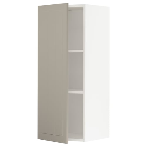 White METOD kitchen cabinet with beige door, adjustable shelf, and nickel-plated hinges.