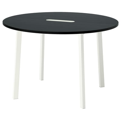 A MITTZON round black conference table with white legs, suitable for small meetings.