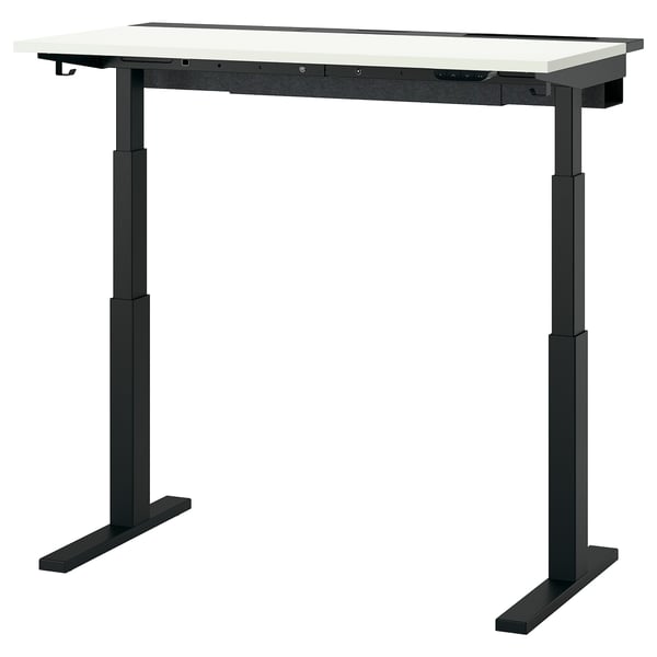 A black adjustable height standing desk, MITTZON, with a light-colored top and sturdy metal legs. Hooks and cable management.