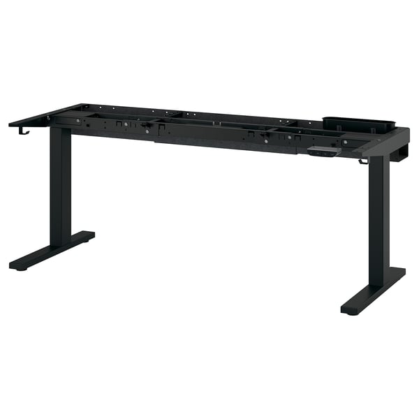 A black height adjustable office desk underframe with metal legs and cable management.