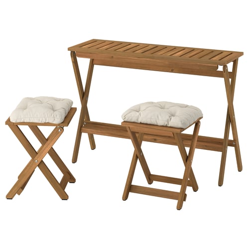 NÄMMARÖ outdoor furniture: small table, 2 stools with beige cushions, acacia wood, x-base design.