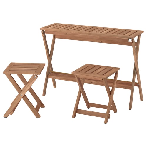 IKEA NÄMMARÖ outdoor table and two chairs, natural wood colour, rectangular design.