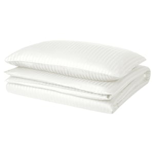 A white NATTJASMIN duvet cover set with subtle stripes, made of cotton and lyocell, neatly folded.