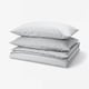 Grey bedding set by PILTANDVINGE, folded with pillowcases, recycled polyester-viscose blend, press-stud closure.