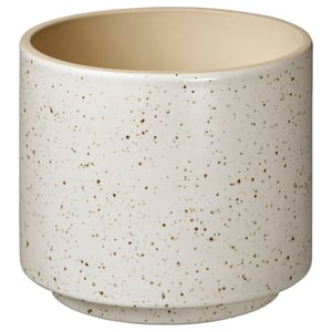 Cylindrical beige planter with subtle speckles, matte finish, simple modern design.
