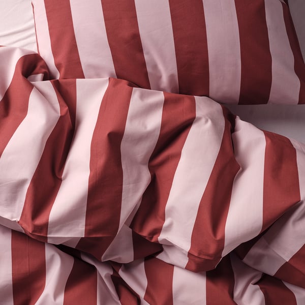 Crisp, striped bedding, made of durable cotton and lyocell, showcasing fresh, modern design.