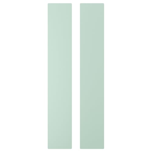 Two tall, light green, rectangular panels side by side.