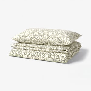 Green SORGMANTEL bed linens with leaf pattern. Includes duvet and pillowcases, recycled polyester and cotton blend.
