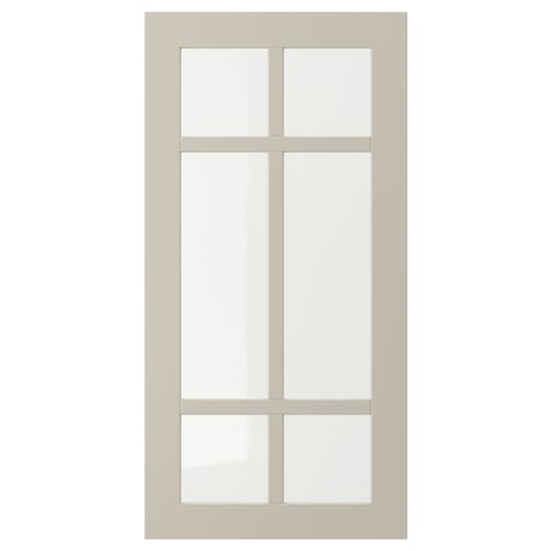 STENSUND beige cabinet door with glass panels.
