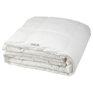 Folded white STRANDMOLKE duvet, soft cotton, quilted squares.