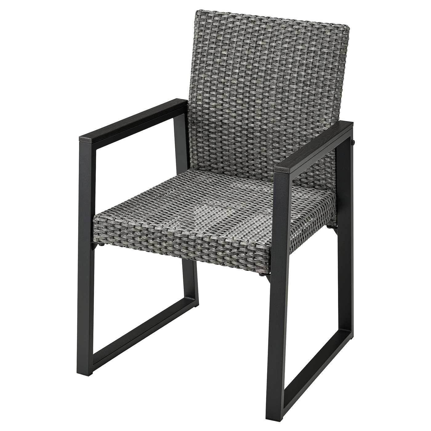 A grey VÄRMANSÖ patio chair with a wicker seat and back, black metal frame, armrests, and sleek design.