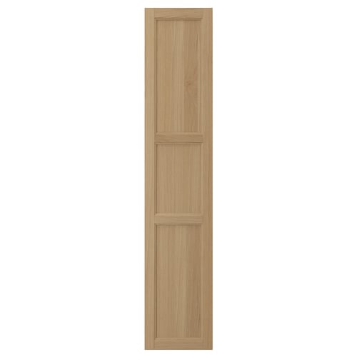 Natural oak wood cabinet door with solid oak frame and three vertical panels.