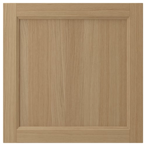 Natural wood cabinet door, square shape, oak grain detail. Solid oak frame with veneer panel. Warm, smooth texture.