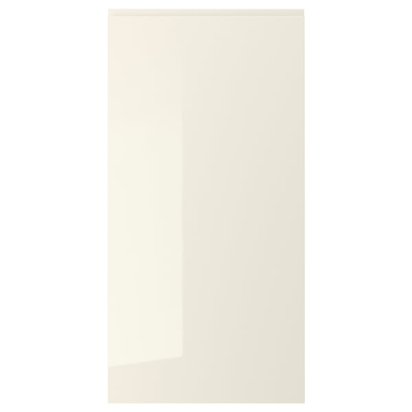 A sleek, beige high-gloss cabinet door with integrated handles, part of the VOXTORP collection.
