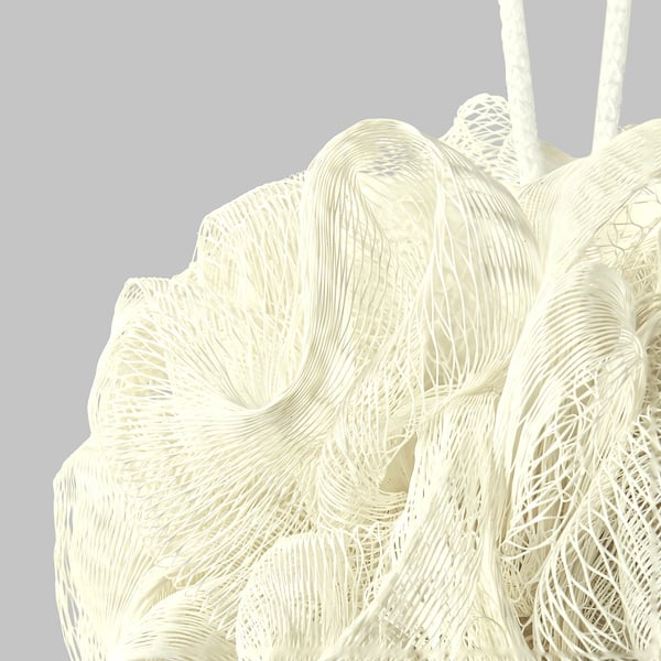 Three white mesh bath puffs, finely detailed and neatly arranged, showing their soft, textured surfaces ready for exfoliation.