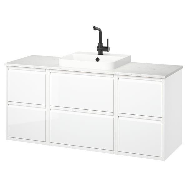 A modern white ÄNGSJÖN bathroom vanity, featuring drawers and a marble countertop with a black fixtures sink.