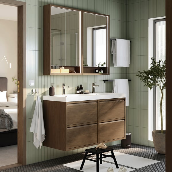 Oak vanity, dual sinks, green walls, black/white floor, modern