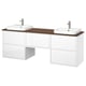 White dual washstand unit with two sinks and wooden countertop.