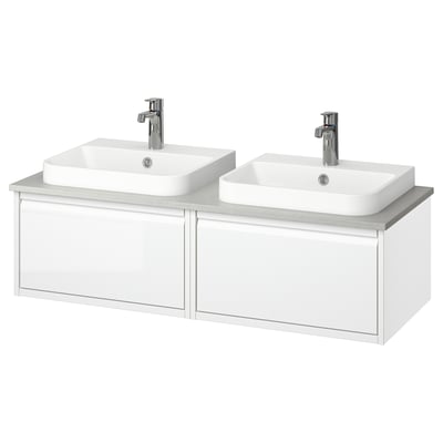 Double white wall-mounted bathroom vanity, rectangular sinks, chrome faucets, sleek design.