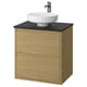 A modern oak bathroom vanity with a black countertop and a round white basin. It two drawers and a wall-mounted design.