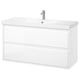 Modern white bathroom vanity with sleek design, two spacious drawers, and integrated handles, featuring a ceramic sink with chrome faucet.