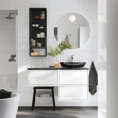 Modern bathroom with ÄNGSJÖN sink, mirror, and shelf.