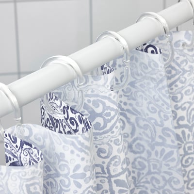 Blue & white shower curtain with medallion pattern, water-repellent, easy to clean.