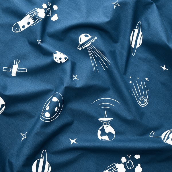 Vibrant space-themed bedding with glowing patterns. Blue fabric, durable, high-quality.