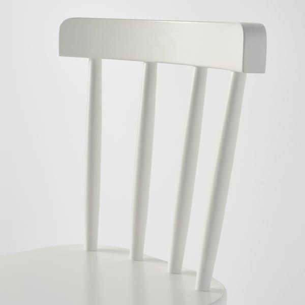 Elegant junior chair, white. Sturdy beech legs, comfy backrest, ideal for kids.