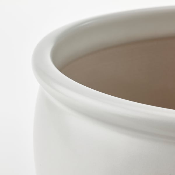 Close-up of AMBRARÖNN stoneware pots smooth, rustic finish and sturdy build.